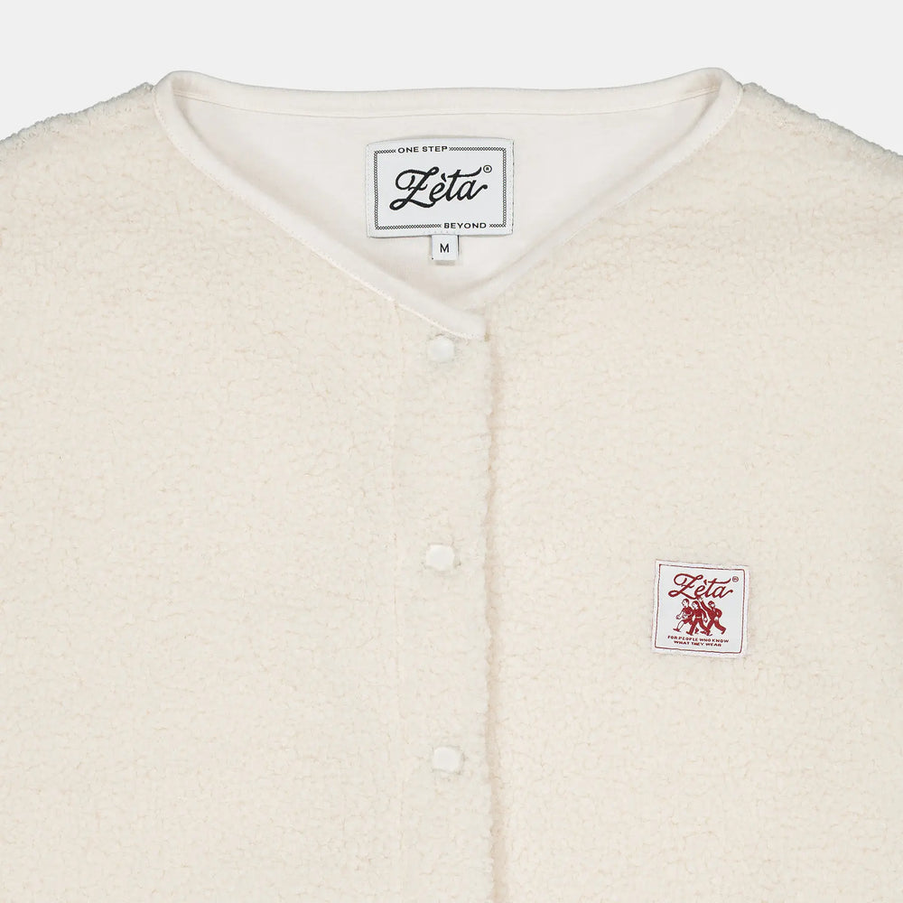 Veste-Polaire-Sherpa-sans-manche-beige-avec-boutons-à-pression-et-poches-extérieures-ultra-moltonnée-et-chaude