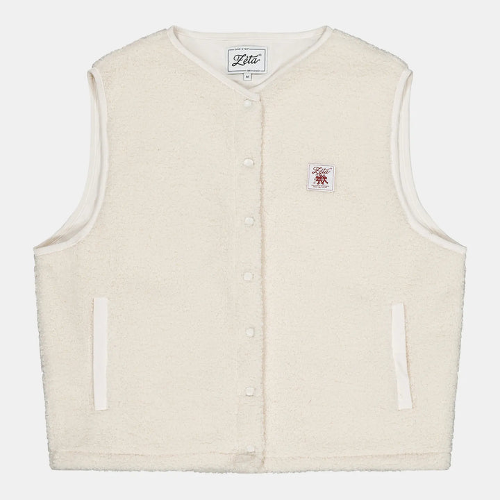 Veste-Polaire-Sherpa-sans-manche-couleur-beige-avec-boutons-à-pression-et-poches-extérieures-ultra-moltonnée-et-chaude