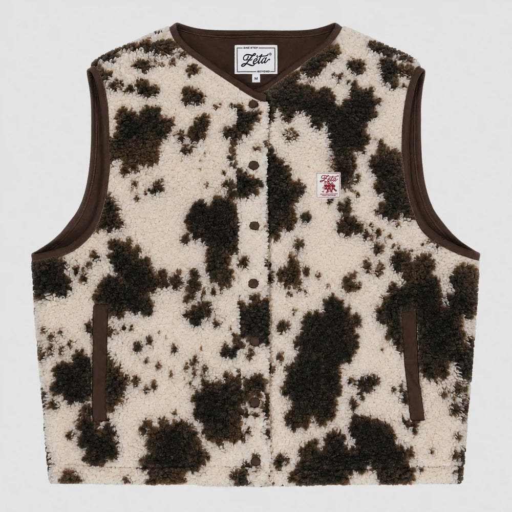 Cow-print sleeveless sherpa jacket