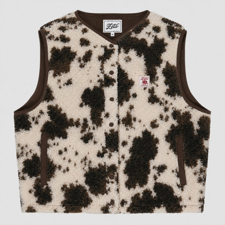 Cow-print sleeveless sherpa jacket